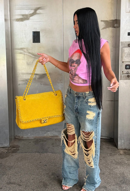 Jeans Baggy "Bronx" Distressed Ispirazione urban e carattere deciso per i jeans "Bronx". Un modello streetwear d'impatto caratterizzato da un lavaggio denim vintage e maxi strappi frontali con lavorazione a trama sfilacciata.