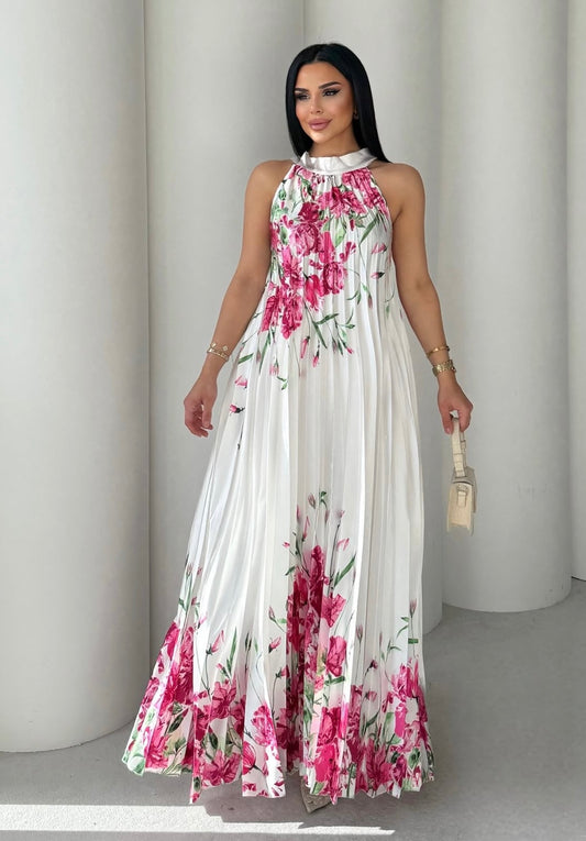 Abito AMANDA lungo plisse con fantasia floreale Taglia unica vestibilità: dalla XS alla XXXL grazie al taglio morbido e ampio.