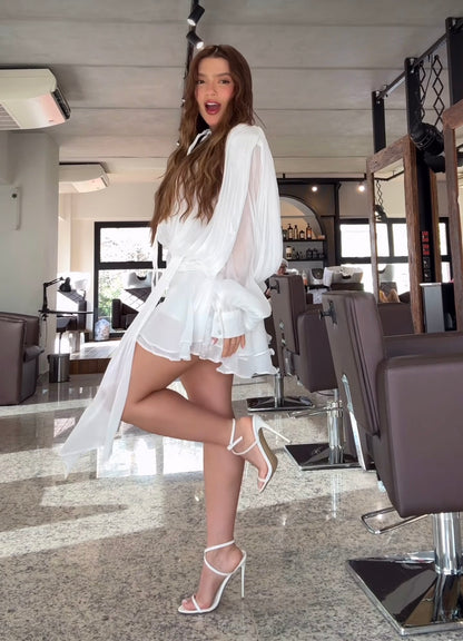 Mini dress CHARLOTTE in dettaglio plissettato su tutto l’abito, manica a sbuffo, elastico sul retro, spallina interna piu pantaloncino non fartelo scappare